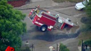 Raw Video Sinkhole Swallows Fire Truck [upl. by Harned]