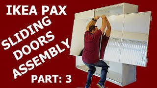 IKEA PAX WARDROBE sliding doors assembly PART 3 [upl. by Ellehsad430]