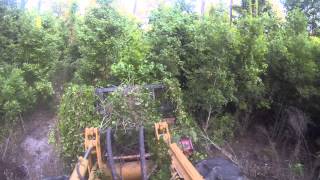 SkidSteer Drum Mulcher Attachment Operating Techniques [upl. by Dinny]