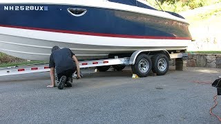 Repositioning a 25 Boat on its trailer while in the driveway [upl. by Enelrae475]