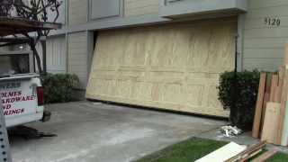 A wood one piece garage door [upl. by Jennee]