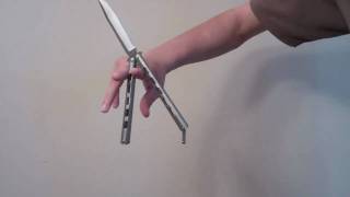 Balisong Tutorial Backhand Twirl Beginner [upl. by Ivers628]