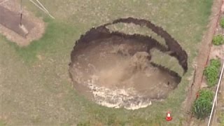 Giant Sinkhole Opens in Backyard [upl. by Hildy]